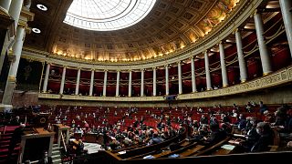 Parliament members attend a session of questions to the Government at the French National Assembly in Paris, France, Jan. 4, 2022.