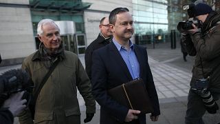 Gay rights activist Gareth Lee, center, leaves Laganside court, Northern Ireland, in March 2015. 