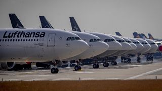 File picture taken June 3, 2020 shows Lufthansa aircrafts parking on a runway at the airport in Frankfurt, Germany