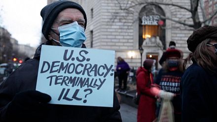 Capitol riot anniversary: activists hold a vigil for democracy
