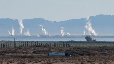 Vapor rises from a geothermal power stations along the coast of the Salton Sea near Calipatria, California, December 15, 2021.