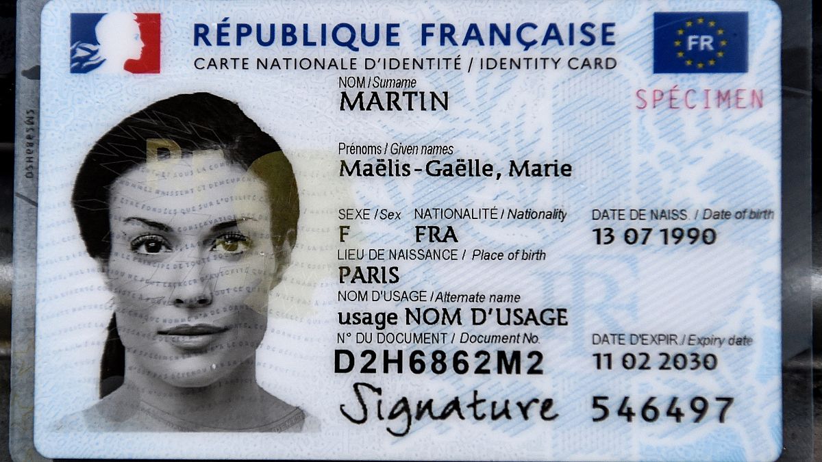 A photograph taken on March 16, 2021 shows a model of the new French electronic identity card.