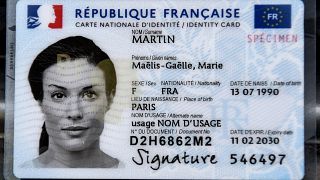 A photograph taken on March 16, 2021 shows a model of the new French electronic identity card.