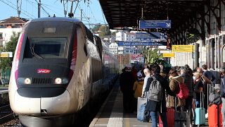 Passengers wait next TGV to Paris at the Saint Jean de Luz train station, Saturday, Oct. 31, 2020.