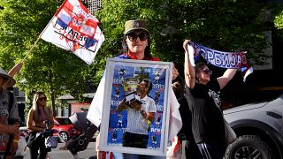 Serbian community rally outside a government detention centre where Serbia's tennis champion Novak Djokovic is staying in Melbourne.