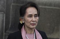  Myanmar's leader Aung San Suu Kyi leaves the International Court of Justice after the first day of three days of hearings in The Hague, Netherlands, on Dec. 10, 2019. 