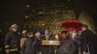 New York City Mayor Eric Adams speaks during a news conference outside an apartment building where a deadly fire occurred in the Bronx on Sunday, Jan. 9, 2022, in New York.