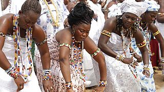 Voodoo worshippers gather in Benin to pay their respects