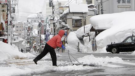 Snowstorms hit Japan`s northern Hokkaido and northeastern region of Tohoku