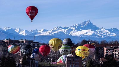 Hot air balloons take off from Mondovì, Italy