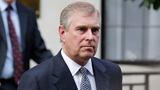 In this Wednesday, June 6, 2012 file photo, Britain's Prince Andrew leaves King Edward VII hospital in London after visiting his father Prince Philip.