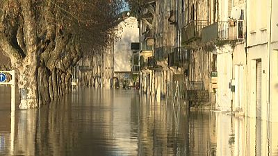 In France's Gironde, locals look on as floodwaters rise