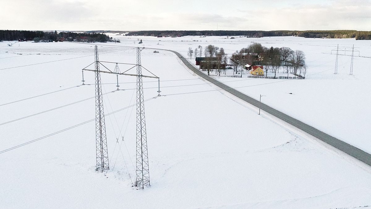 Power lines stand out outside Enkoping, Sweden on March 16, 2018. 
