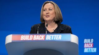 FILE- Anne-Marie Trevelyan Secretary of State for International Trade speaks at the Conservative Party Conference in Manchester, England, Sunday, Oct. 3, 2021.