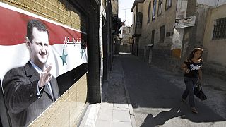 Un portrait de Bachar Al Assad dans une rue de Damas, Syrie, le 15 septembre 2011 - archive