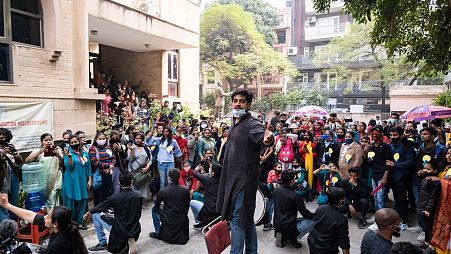 Theatre artists perform 'nukkad natak' in public spaces to make people aware of social issues in Delhi, India
