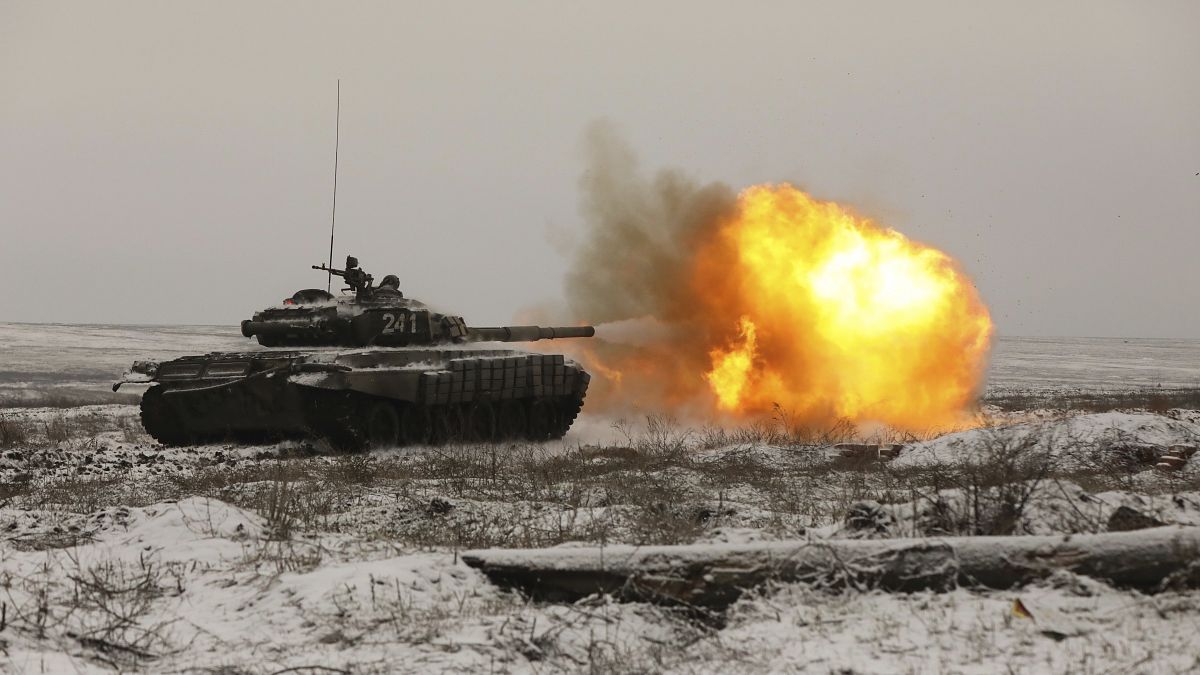 A Russian tank T-72B3 fires as troops take part in drills at the Kadamovskiy firing range in the Rostov region in southern Russia, on Jan. 12, 2022.