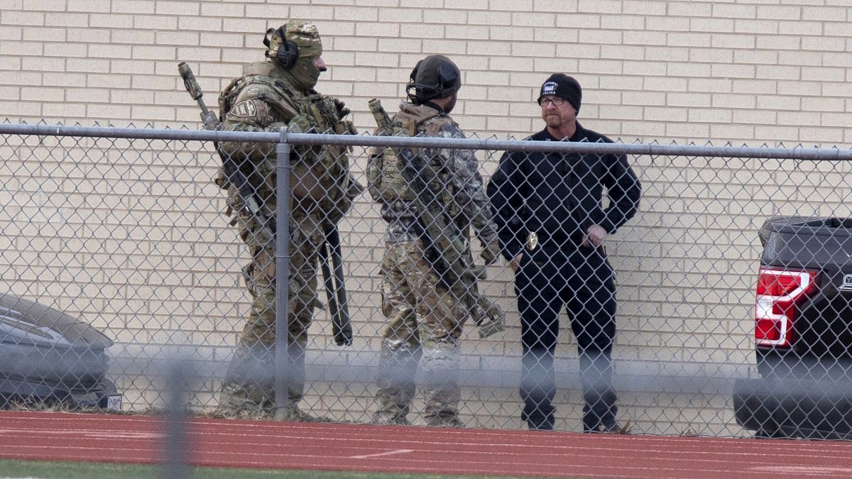 Law enforcement officials gather at a local school near the Congregation Beth Israel synagogue on Jan. 15, 2022 in Colleyville, Texas. 