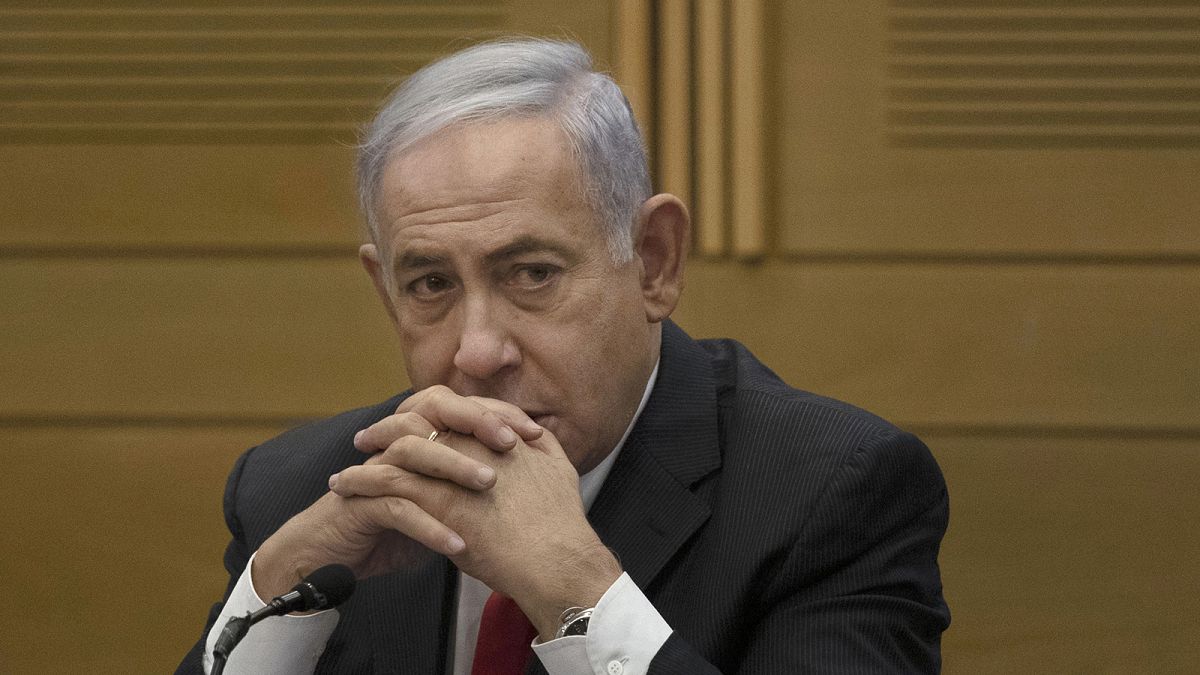 Former Israeli prime minister Benjamin Netanyahu speaks to right-wing opposition party members, at the Knesset in Jerusalem