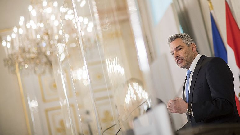 Austrian Chancellor Karl Nehammer presents a bill for a planned compulsory vaccination due to the COVID19-virus at a press conference in Vienna