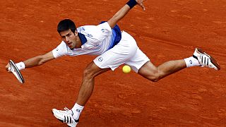 El serbio Novak Djokovic durante un partido de cuartos de final del Roland Garros contra Jurgen Melzer en 2010