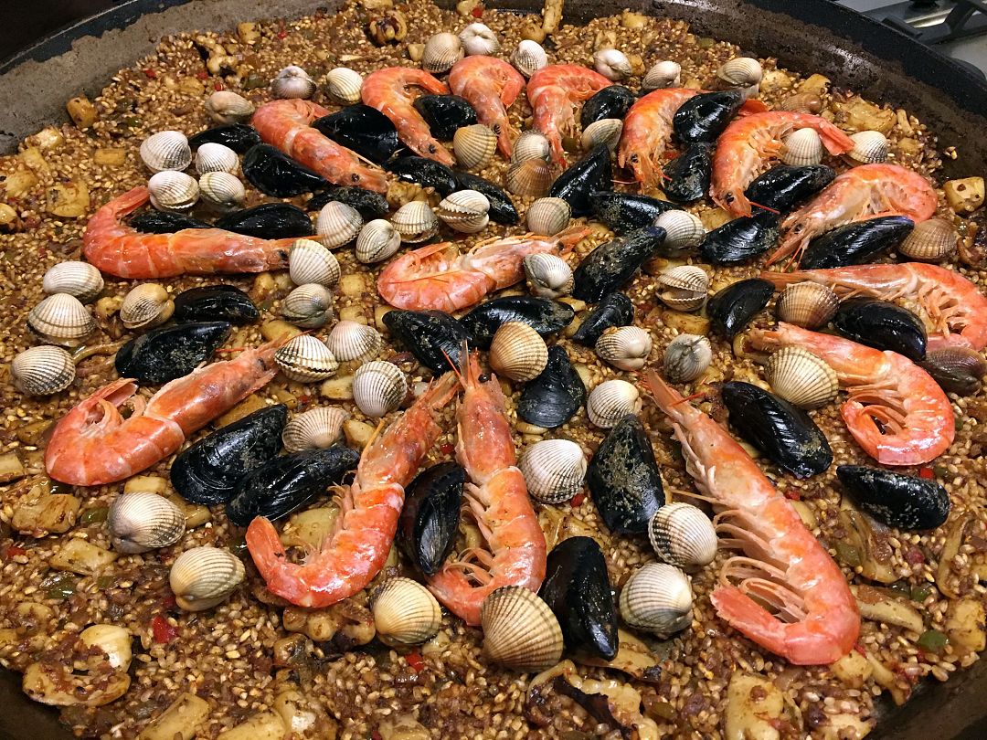 How to make Paella Valenciana the traditional recipe behind Spain's