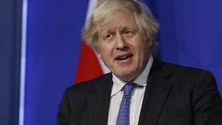 Britain's Prime Minister Boris Johnson speaks during a media briefing on COVID-19, in Downing Street, London, Dec. 15, 2021.