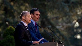 Spanish Prime Minister Pedro Sanchez, right, addresses the media next to German Chancellor Olaf Scholz after a meeting at the Moncloa palace in Madrid, Spain, 17 Jan. 2022.