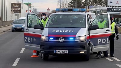Police check people who want to leave Wiener Neustadt, Austria, March 13, 2021. 
