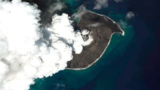 This satellite image provided by Maxar Technologies shows a view of Hunga Tonga Hunga Ha’apai volcano in Tonga, Jan. 18, 2022 after a huge undersea volcanic eruption.