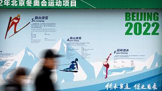 Çin'in başkenti Pekin'de bir panoya yapıştırılan Olimpiyat Oyunları reklamı