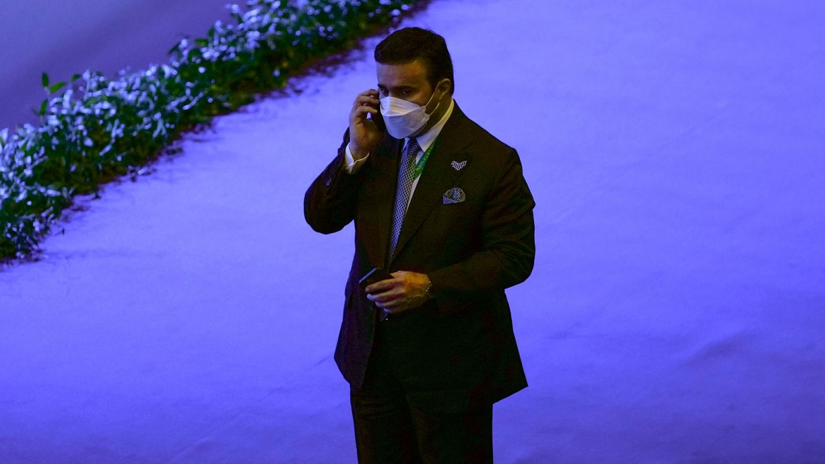 FILE - Maj. Gen. Ahmed Naser al-Raisi speaks on his cell phone during the first day of the Interpol annual assembly in Istanbul, Turkey, November 2021.