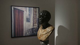 A marble bust and one of Julien Drach's photography at the 'Stone III' auction in London. 