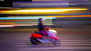 People are turning to e-bikes and new battery cell charging stations to get around Taipei.