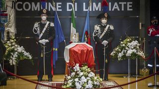 Carabinieri officers stand by the coffin of Luca Attanasio in Limbiate last February.
