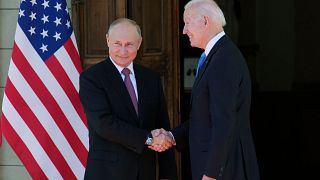 FILE - Russian President Vladimir Putin, left, and U.S President Joe Biden