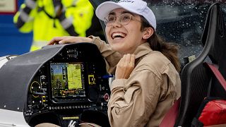 Belgium-British teenage pilot Zara Rutherford smiles after she landed with her Shark ultralight plane at the Egelsbach airport in Frankfurt, Germany.