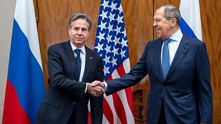 US Secretary of State Antony Blinken, left, with Russian Foreign Minister Sergei Lavrov, right, prior to their meeting in Geneva, Switzerland, 21 January, 2022