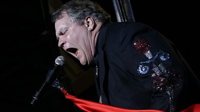 Meat Loaf performs at the football stadium at Defiance High School in Defiance, Ohio, Thursday, Oct. 25, 2012.