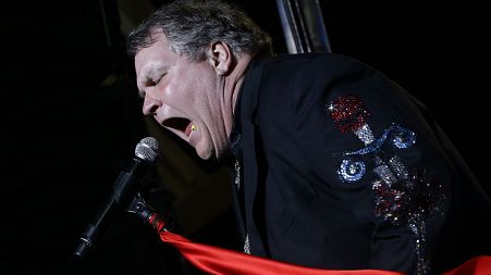 Meat Loaf performs at the football stadium at Defiance High School in Defiance, Ohio, Thursday, Oct. 25, 2012.