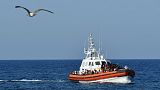 An Italian Guardia Costiera (Coast Guard) boat arrives at a port in Lampedusa.