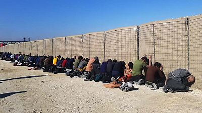 IS group fighters, arrested by the Kurdish-led Syrian Democratic Forces after they attacked Gweiran Prison, in Hassakeh, northeast Syria, Friday, Jan. 21, 2022.