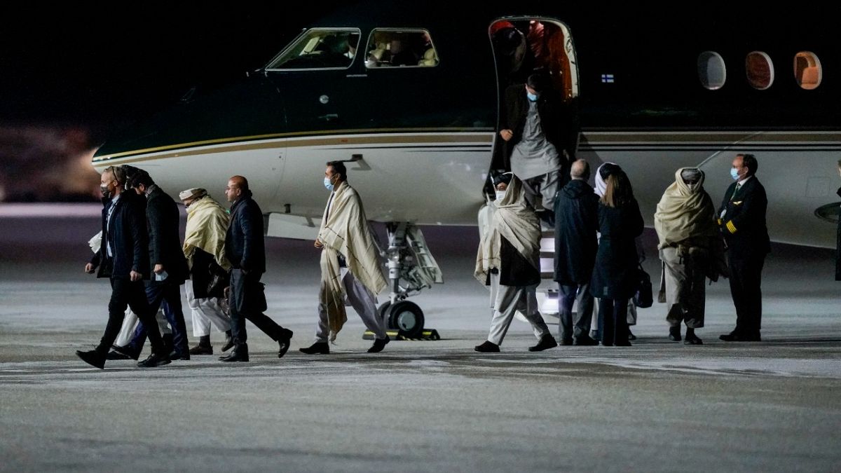 Representatives of the Taliban arrive in Gardermoen, Norway, Saturday, Jan. 22, 2022. A Taliban delegation has traveled to Norway for talks.