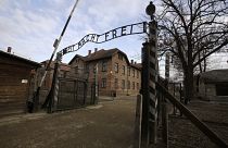 The words "Work Sets You Free" are seen on the gate of the Auschwitz former Nazi death camp in Oswiecim.