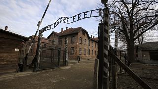 The words "Work Sets You Free" are seen on the gate of the Auschwitz former Nazi death camp in Oswiecim.