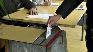 Citizens cast their votes during Finnish parliamentary elections, at the town hall in Manstala