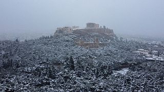 The ancient Acropolis hill is covered with snow in Athens, Greece, 24 January 2022.