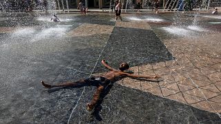 Kais Bothe relaxes in the cool in the city hall pool, as temperatures hit 37 degrees Celsius in Edmonton, Alberta, on Wednesday, June 30, 2021.