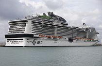 The MSC Grandiosa cruise ship is harbored in Civitavecchia, Central Italy, Tuesday, Jan. 4, 2022. 