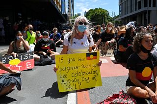 Protesters take part in an "Invasion Day" demonstration on Australia Day in Sydney on January 26, 2022.